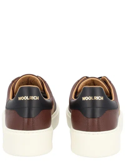 Woolrich Sleek Low-top Sneakers With Suede Side Panels And Gold Branding In Brown