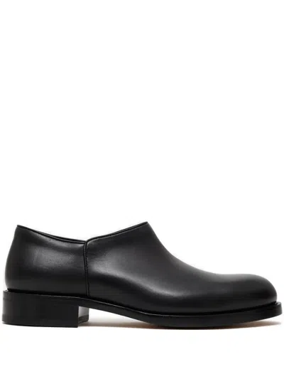 The Row Nobilis Leather Slip-on Shoes In Black