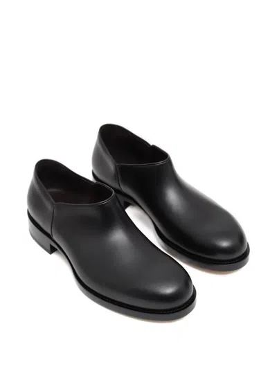 The Row Nobilis Leather Slip-on Shoes In Black