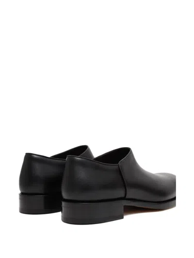 The Row Nobilis Leather Slip-on Shoes In Black