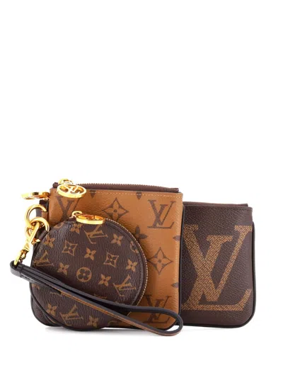 Pre-owned Louis Vuitton Trio Pouch Set Reverse Monogram Giant Clutch Bag In Brown