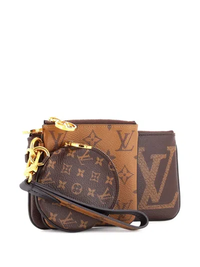 Pre-owned Louis Vuitton Trio Pouch Set Reverse Monogram Giant Clutch Bag In Brown