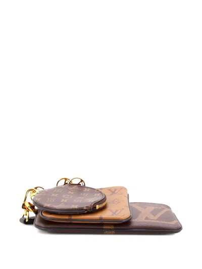 Pre-owned Louis Vuitton Trio Pouch Set Reverse Monogram Giant Clutch Bag In Brown