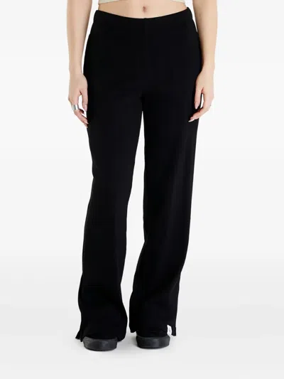 Calvin Klein Ribbed Side-pocket Trousers In Black