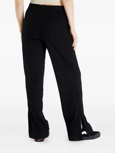Calvin Klein Ribbed Side-pocket Trousers In Black