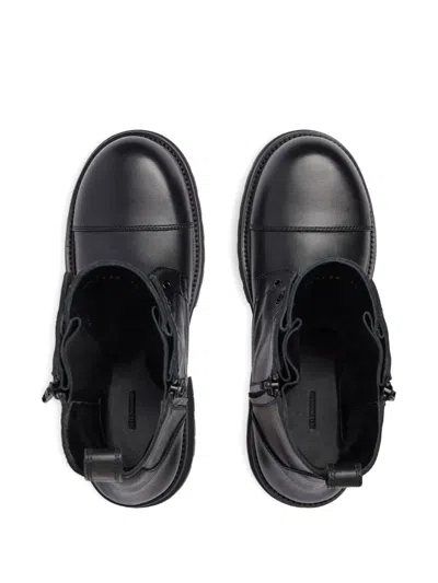Balenciaga Rugged Leather Ankle Boots With Chunky Sole In Black
