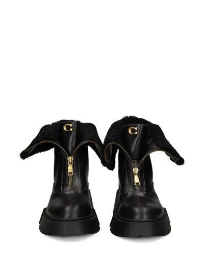 Coach Leah Black Leather Front Zip Platform Boots In Black