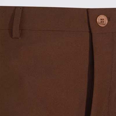 Gucci Pressed-crease Trousers In Brown