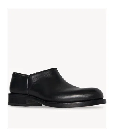 The Row Nobilis Leather Slip-on Shoes In Black