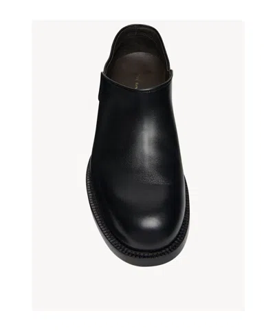 The Row Nobilis Leather Slip-on Shoes In Black