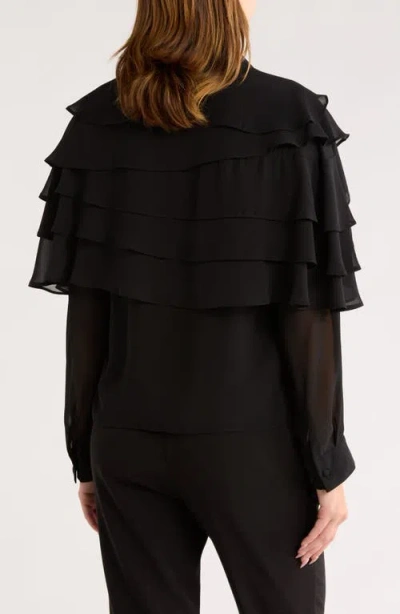 Area Stars Ruffle Long Sleeve Top In Black