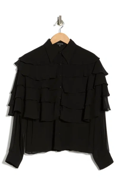 Area Stars Ruffle Long Sleeve Top In Black