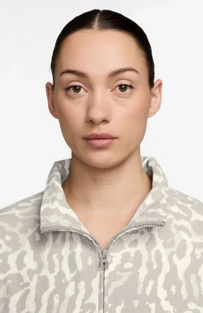 Nike Leopard Print Swoosh Water Repellent Jacket In Multi