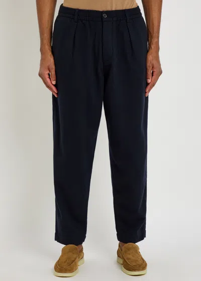 Universal Works Relaxed Tapered-leg Wool-blend Trousers In Black