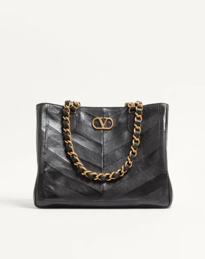 Valentino Garavani  Garavani Laseine Shopping Bag In Nappa Leather With A Chevron Pattern W In Black