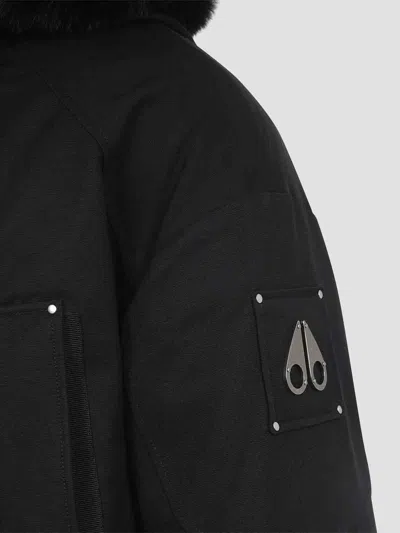 Moose Knuckles Feather Down Insulated Black Parka With Plush Fur-lined Hood In Blue