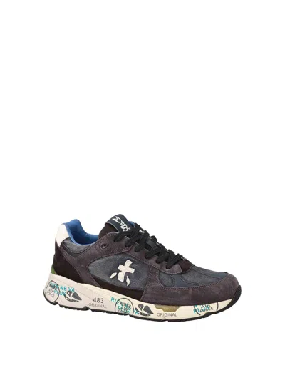 Premiata Low-top Sneakers With Graphic Text Accents In Blue
