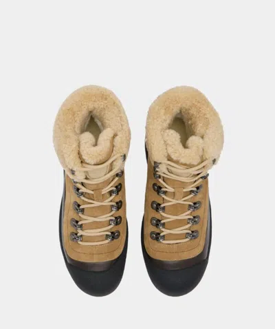 Bally Curling Shearling Boots In Brown