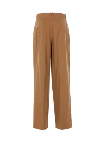 The Row Trousers In Brown