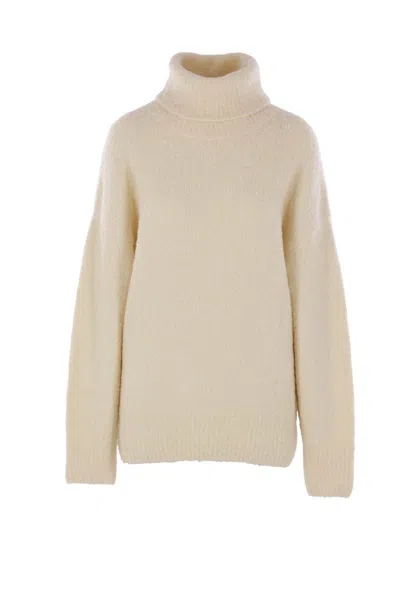 Totême Ribbed-knit Wool-blend Turtleneck Sweater In Neutral