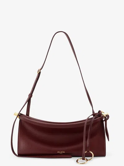 Alaïa Alaia Women East West Leather Shoulder Bag In Burgundy