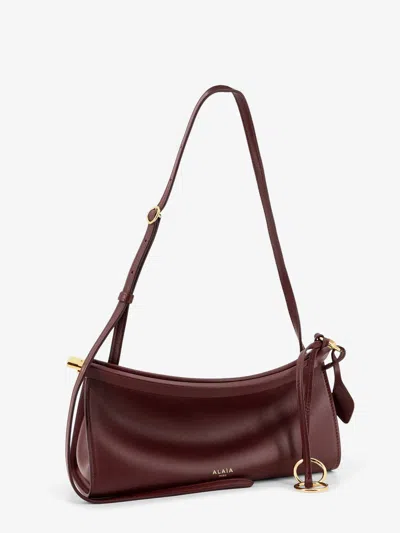 Alaïa Alaia Women East West Leather Shoulder Bag In Burgundy