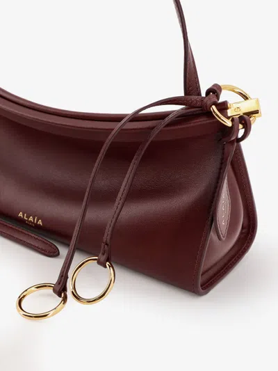 Alaïa Alaia Women East West Leather Shoulder Bag In Burgundy