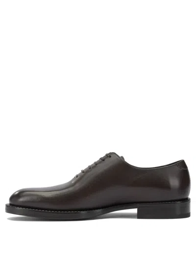 Ferragamo Round Toe Leather Lace-up Footwear In Brown