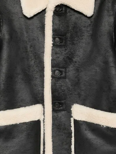 Dunst Reversible Unisex Shearling Jacket In Black