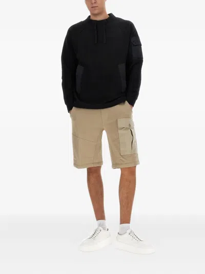 Ten C Relaxed Fit Long-sleeve Tee With Adjustable Drawstrings And Unique Pockets In Black