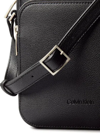 Calvin Klein Pebbled-texture Zip Messenger Bag In Black