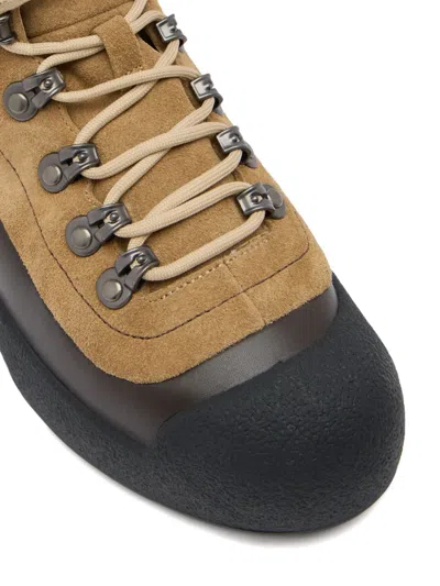 Bally Curling Shearling Boots In Brown