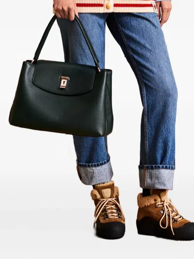 Bally Curling Shearling Boots In Brown