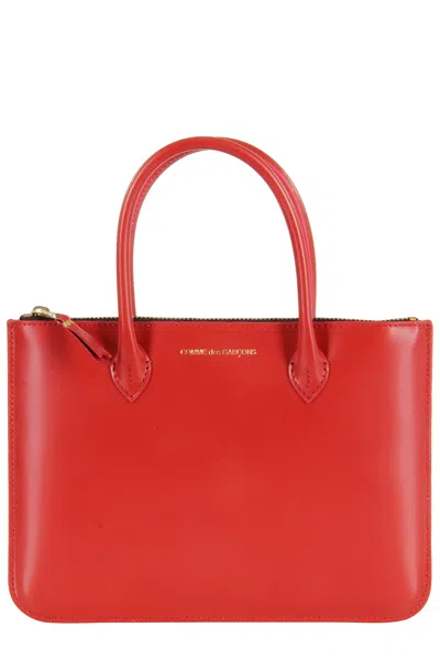 Comme Des Garçons Handles In Red