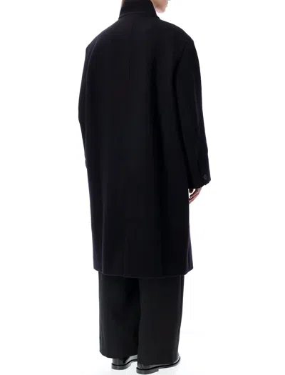 Studio Nicholson Long Coat With Structured Shoulders And Pockets In Black