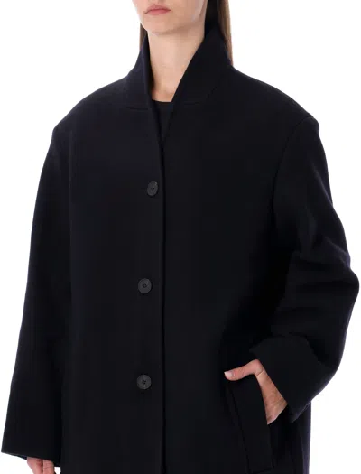 Studio Nicholson Long Coat With Structured Shoulders And Pockets In Black