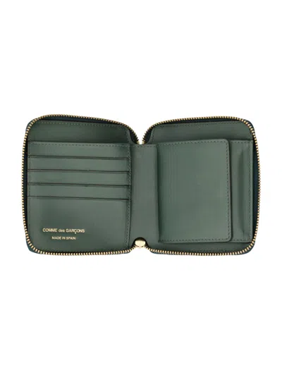 Comme Des Garçons Vertical Zip Around Wallet In Green