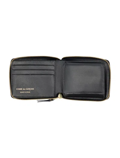 Comme Des Garçons Wallet Embossed Logotype Wallet In Black