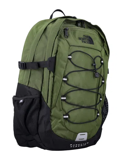 The North Face Backpack With Front Zip Pocket And Bungee Cord System In Green