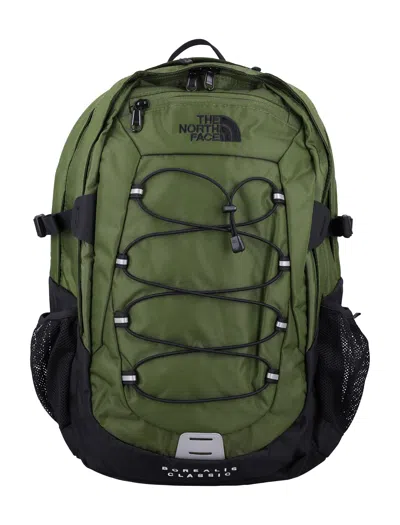 The North Face Backpack With Front Zip Pocket And Bungee Cord System In Green