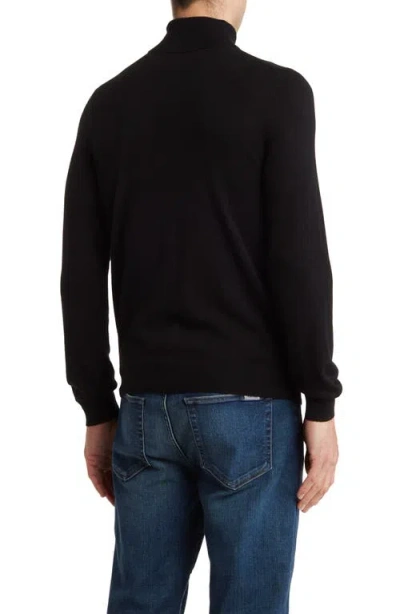 Amicale Turtleneck Cashmere Sweater In Black