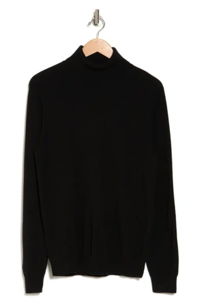 Amicale Turtleneck Cashmere Sweater In Black