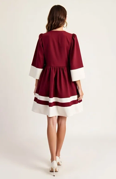 Modenaire Fit And Flare Mini Dress With Contrast Cuff, Hemline And Notch Neck In Burgundy