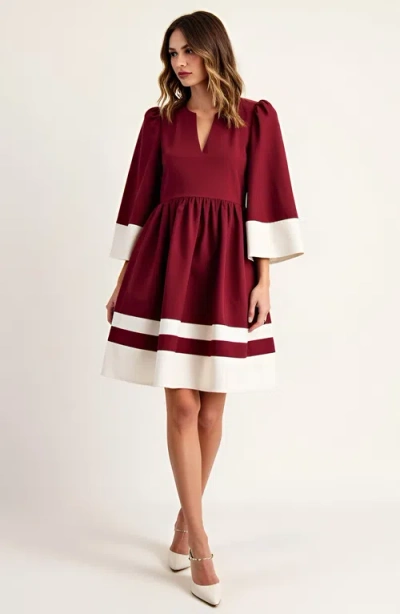 Modenaire Fit And Flare Mini Dress With Contrast Cuff, Hemline And Notch Neck In Burgundy