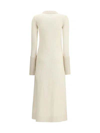 Sa Su Phi Dresses In White