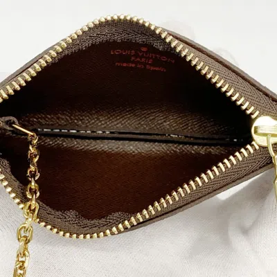 Pre-owned Louis Vuitton Ebene Coin Purse/coin Case () In Brown