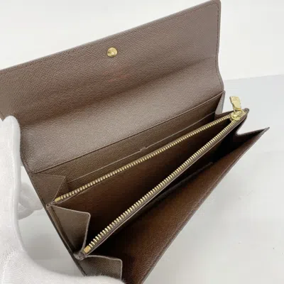 Pre-owned Louis Vuitton Ebene Long Wallet (bi-fold) () In Brown