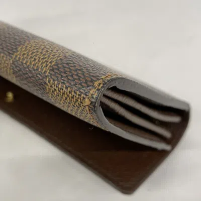 Pre-owned Louis Vuitton Ebene Long Wallet (bi-fold) () In Brown