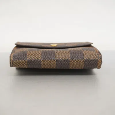Pre-owned Louis Vuitton Ebene Wallet (tri-fold) () In Brown