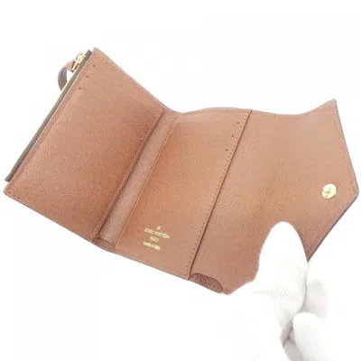 Pre-owned Louis Vuitton Marron Coated Canvas Wallet (tri-fold) () In Brown